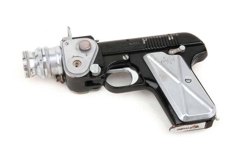 futuristic looking handguns